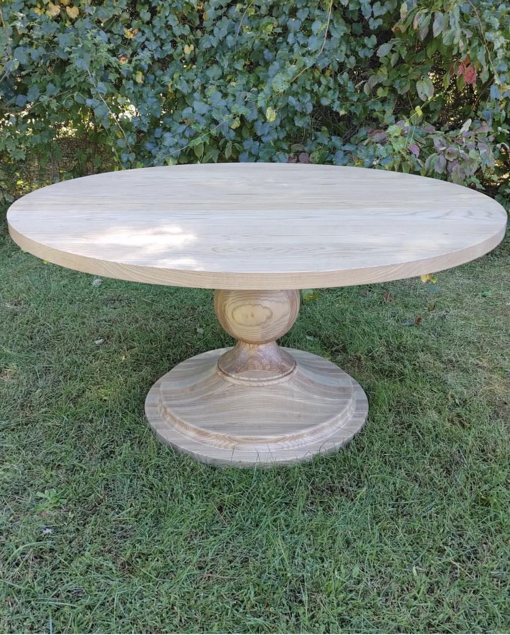 Solid ash 60" circular table with weathered oak stain